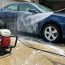 Man cleaning his car with a EMKO Pressure Washer